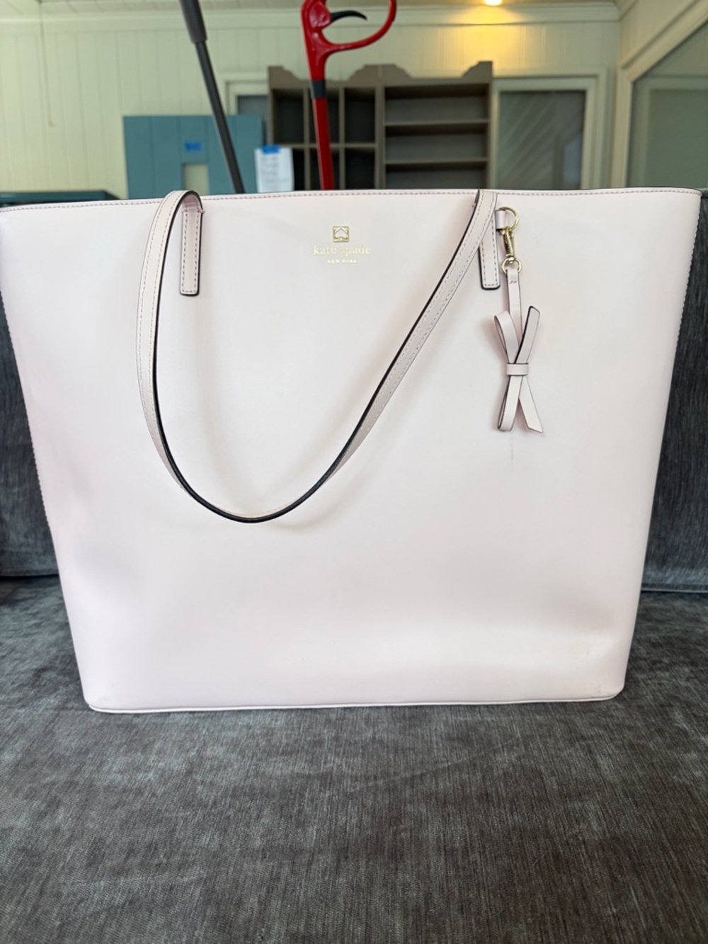 kate spade pale blush leather tote with bow charm